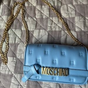 MOSCHINO BLUE LEATHER WALLET PURSE NEVER USED, AMAZING CONDITION.